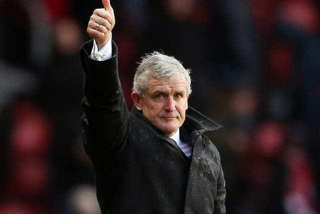 Mark Hughes gives the thumbs up form the touchline