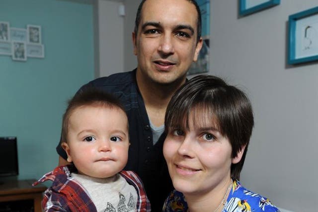 Marie Walker, 33, and her partner, Brian Serajuddy, 39, with their eight-month-old son Harry