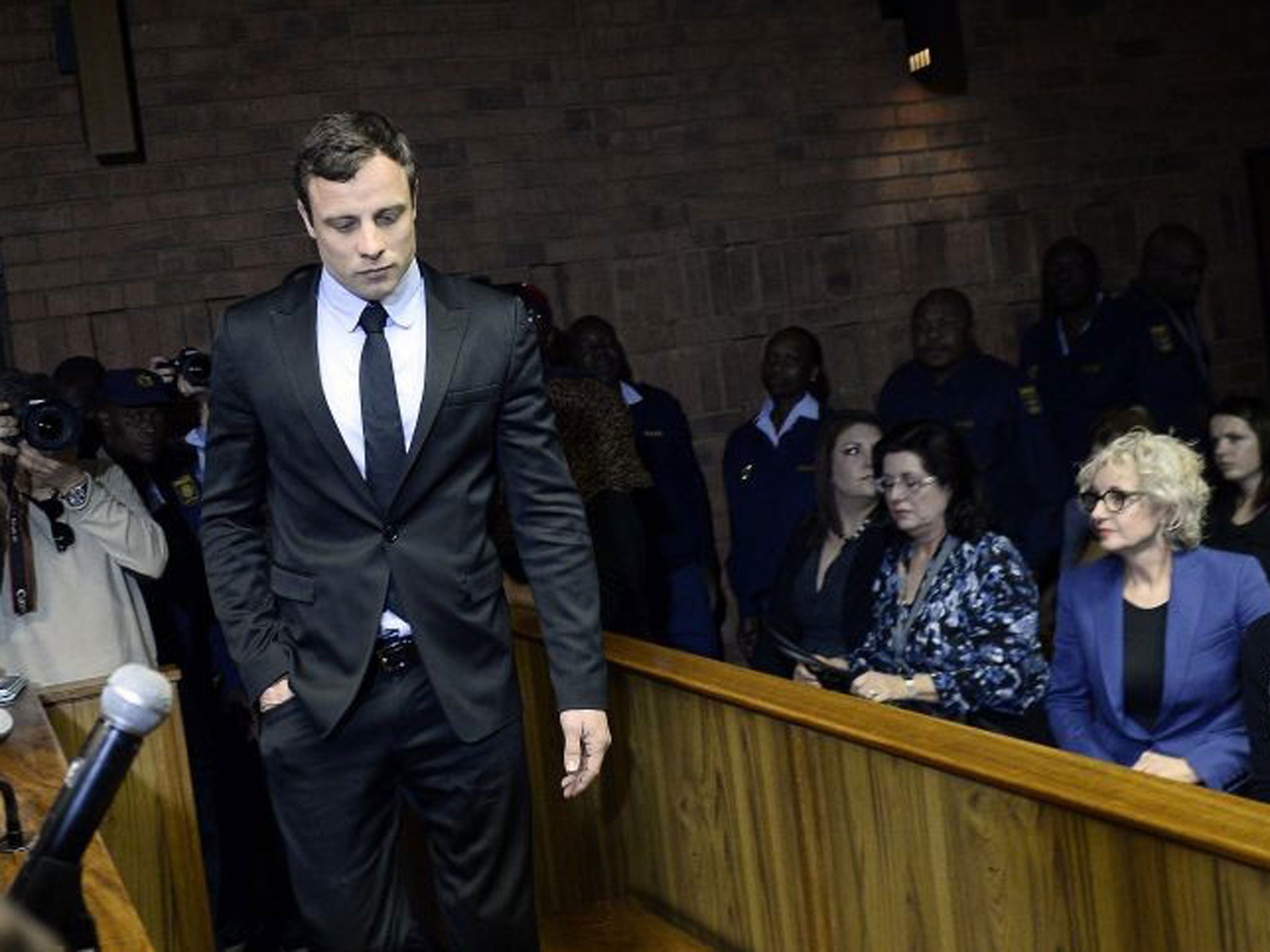 Oscar Pistorius enters court in Pretoria last August
