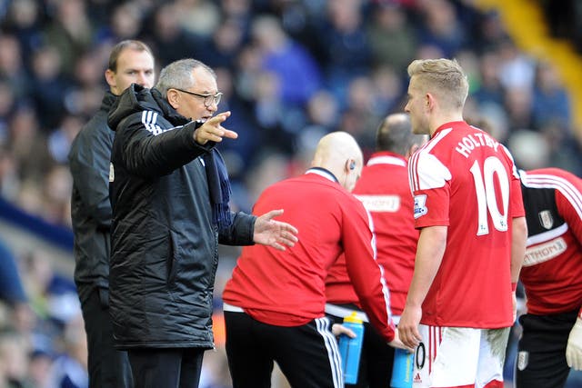 Fulham manager Felix Magath makes a gesture from the touchline