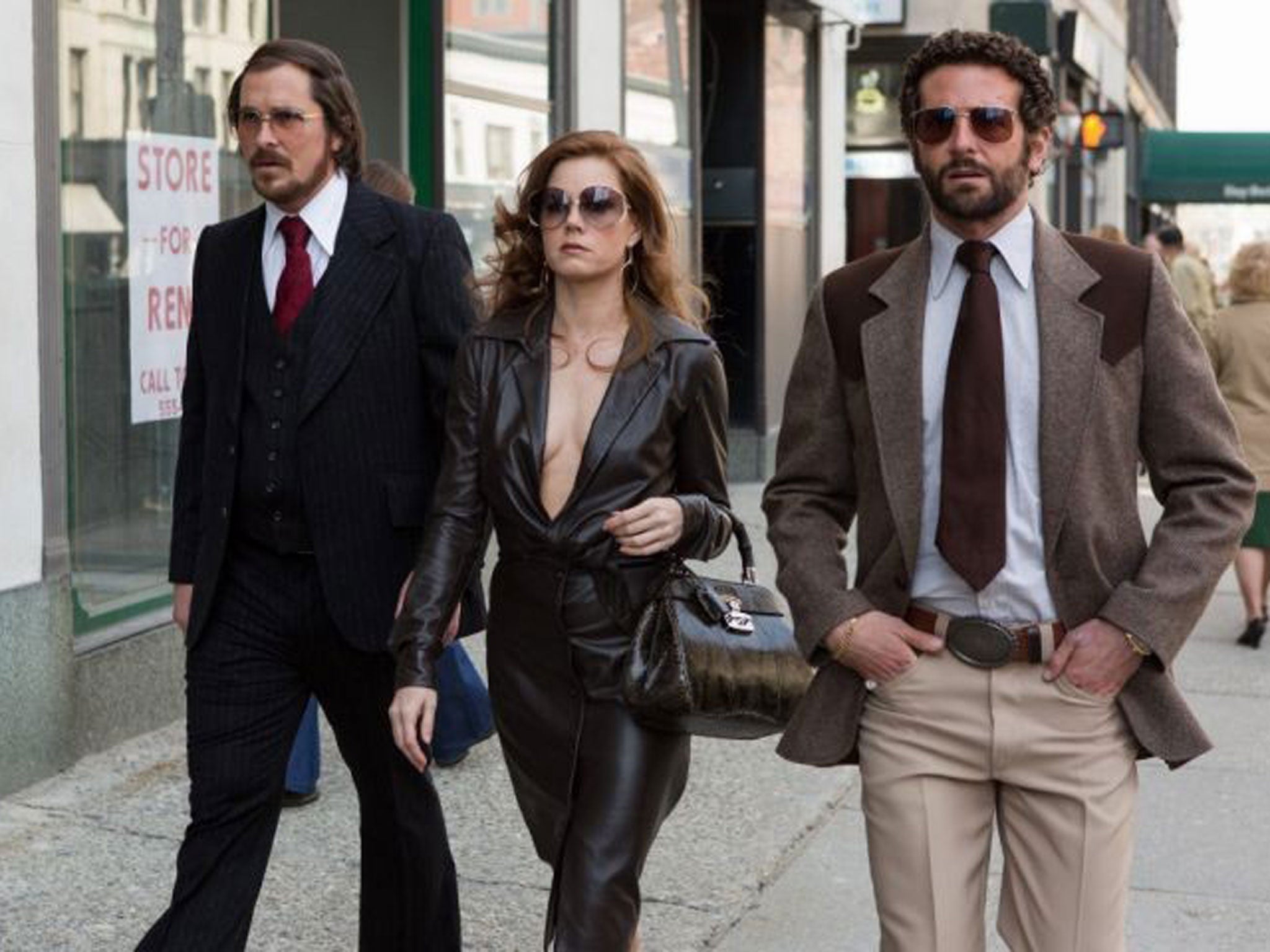 All star cast: Christian Bale, Amy Adams and Bradley Cooper in ‘American Hustle’