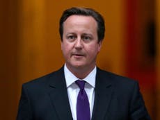 Cameron warns that ‘the world is watching’