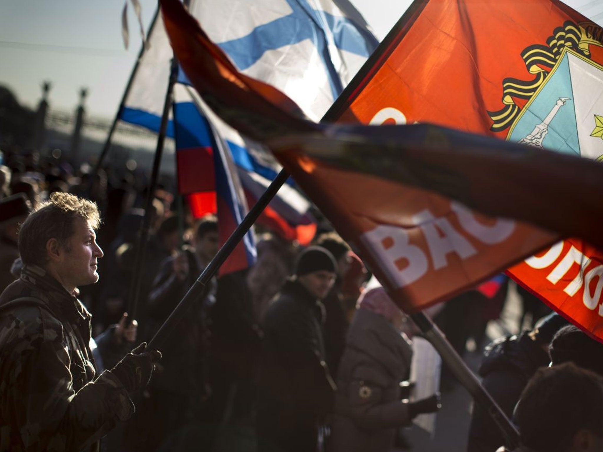 Pro-Russian supporters in Sevastopol wave flags