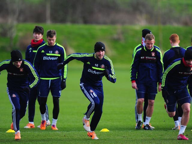 On your marks: Sunderland players in training yesterday as they gear up for their big day out at Wembley