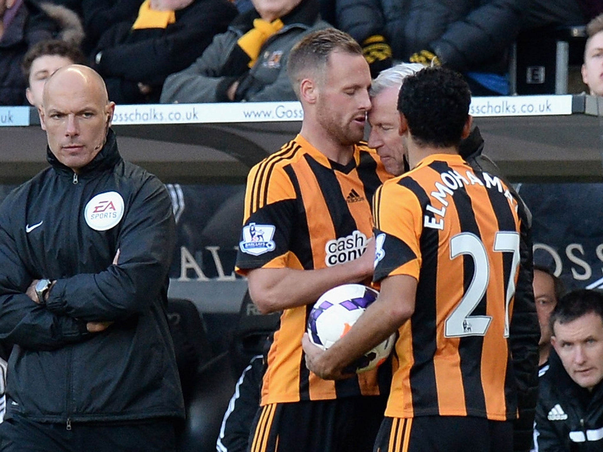 Heading for trouble: Alan Pardew attacks David Meyler in a confrontation which led to him being sent to the stands at the KC Stadium