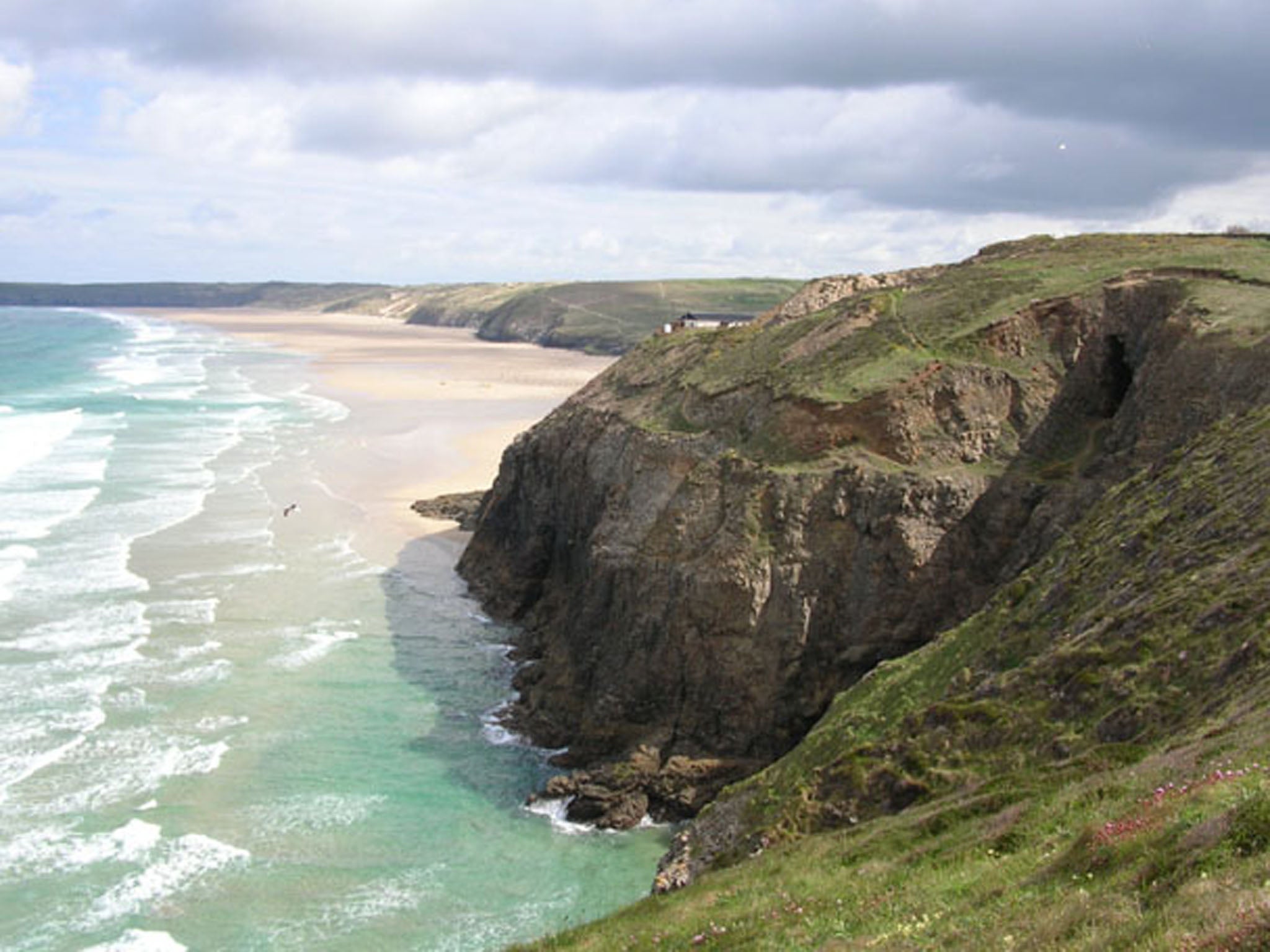 The man's body was found washed up naked on Perranporth beach in Cornwall