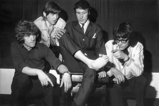 Lee's band in 1968, including Ian Hunter, far left, inspect the foot with which Lee played the piano 