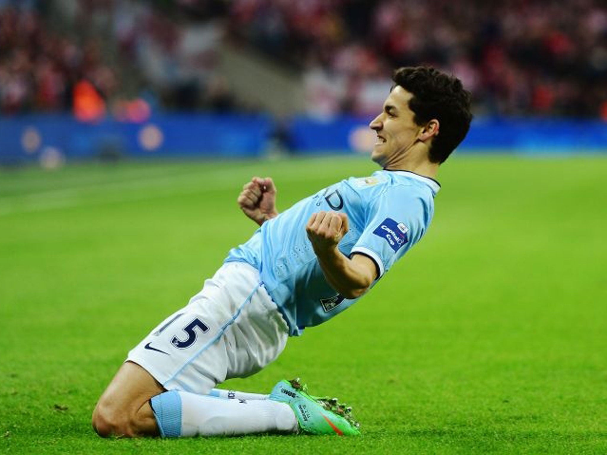 Jesus Navas of Manchester City celebrates after scoring his team's third goal during the Capital One Cup Final between Manchester City and Sunderland at Wembley Stadium (Getty)