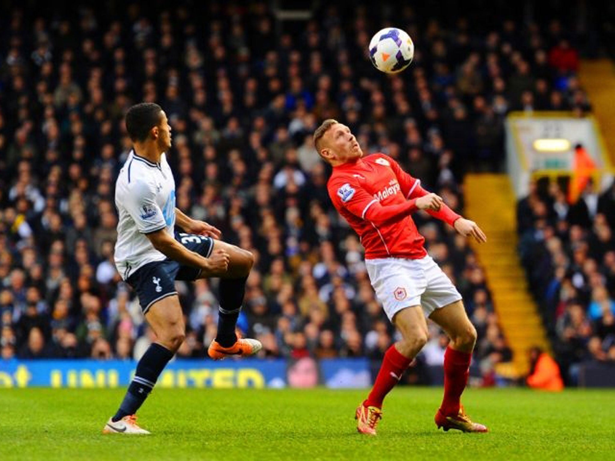 Craig Bellamy fends off Tottenham's Ezekiel Fryers (GETTY)