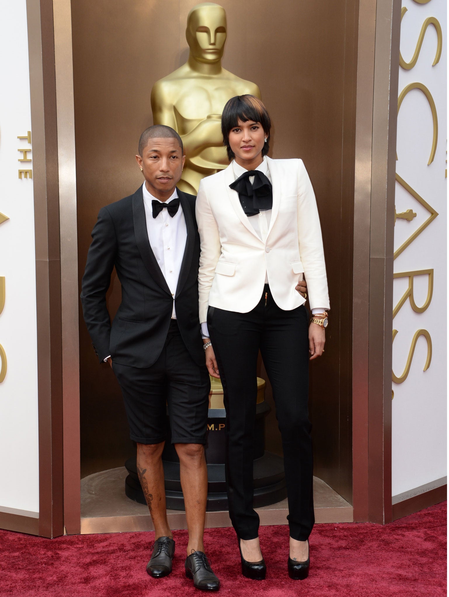 Pharrell Williams leaves the Grammy Awards hat at home in favour of a suit... With shorts