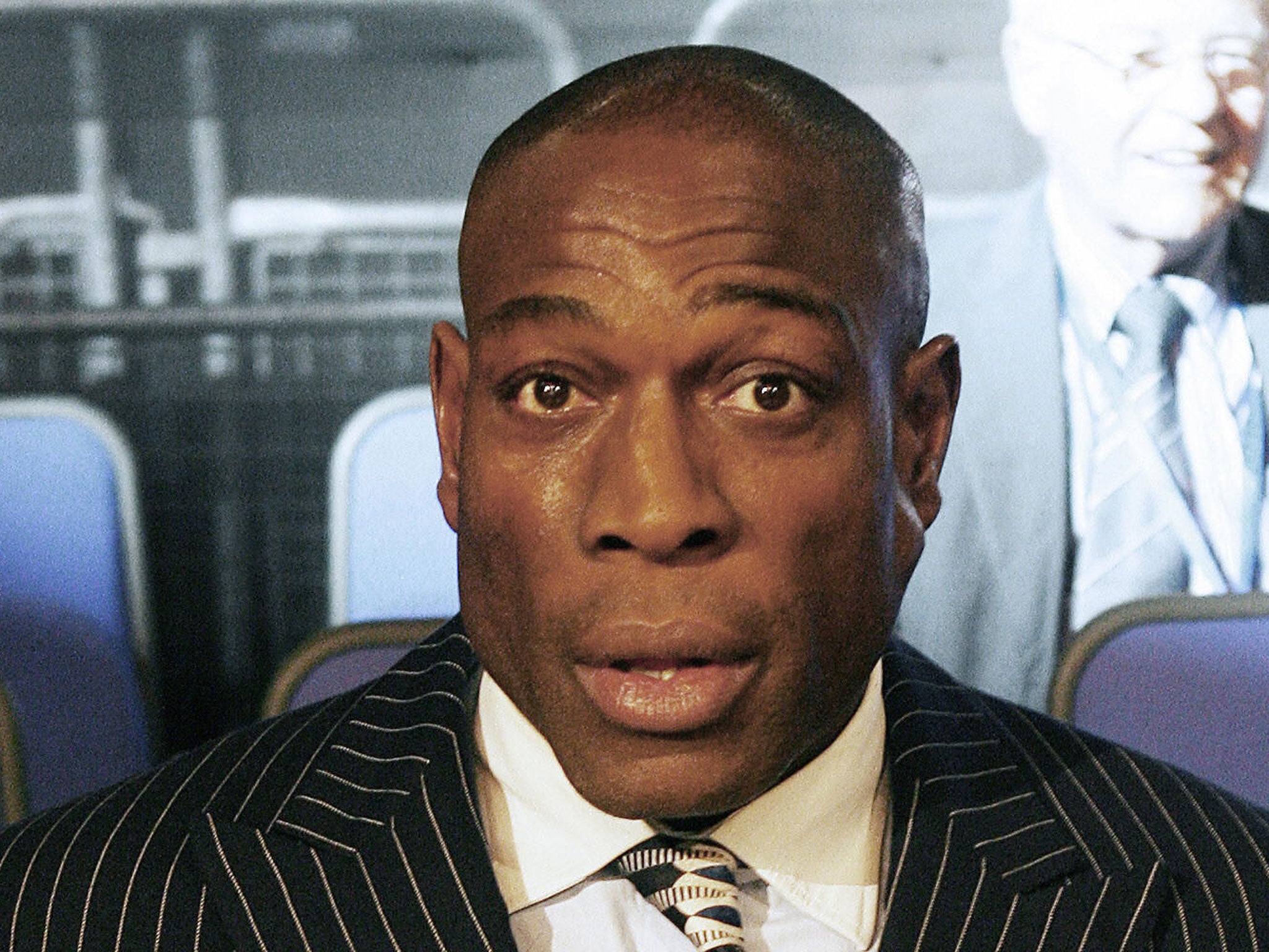 Frank Bruno is swapping his boxing gloves for hairdressers' scissors
