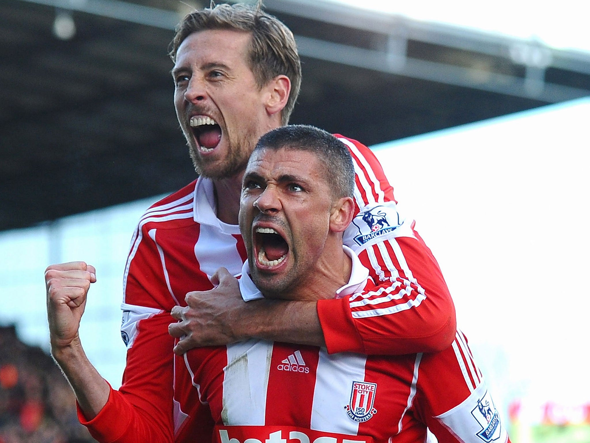 Jon Walters (front) and Peter Crouch celebrate Stoke's 1-0 win