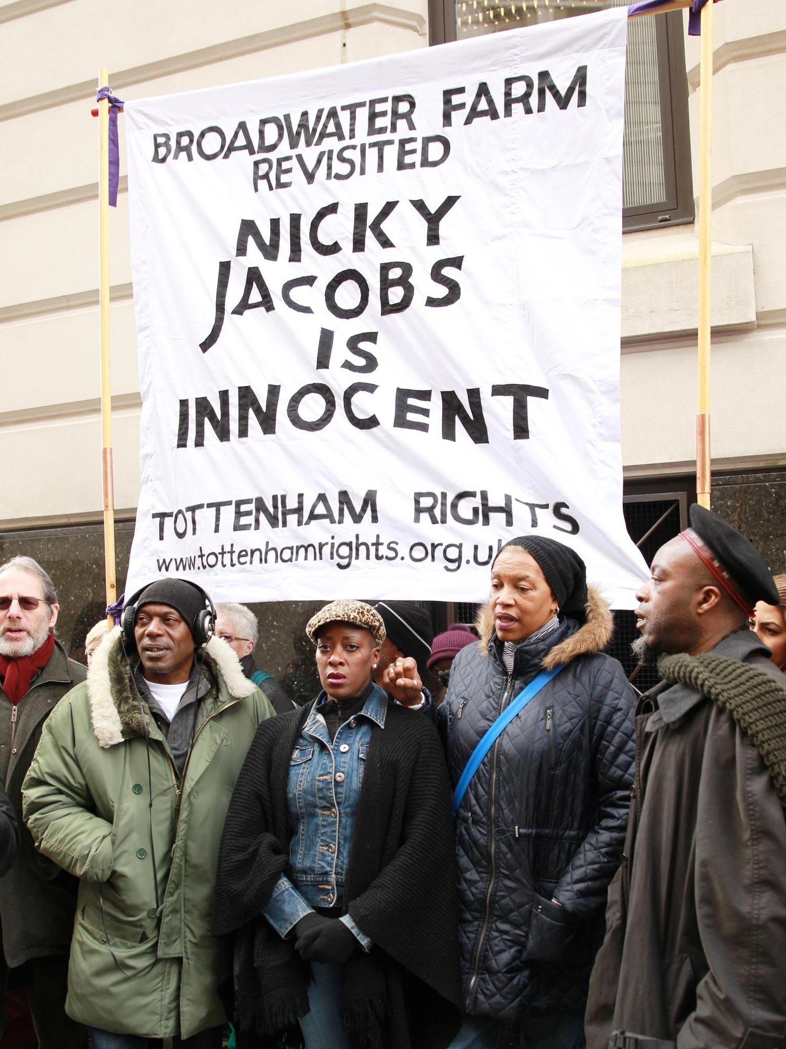 Protesters outside the Old Bailey, as Nicholas Jacobs stands trial today for the murder of the Pc Keith Blakelock