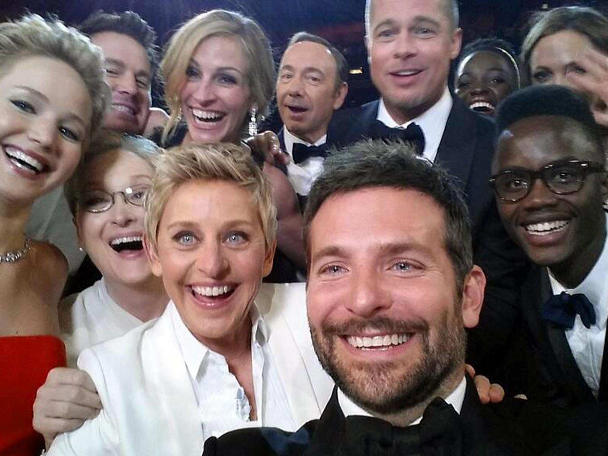 Actors front row from left, Jared Leto, Jennifer Lawrence, Meryl Streep, Ellen DeGeneres, Bradley Cooper, Peter Nyongío Jr., and, second row, from left, Channing Tatum, Julia Roberts, Kevin Spacey, Brad Pitt, Lupita Nyongío and Angelina Jolie as they pose