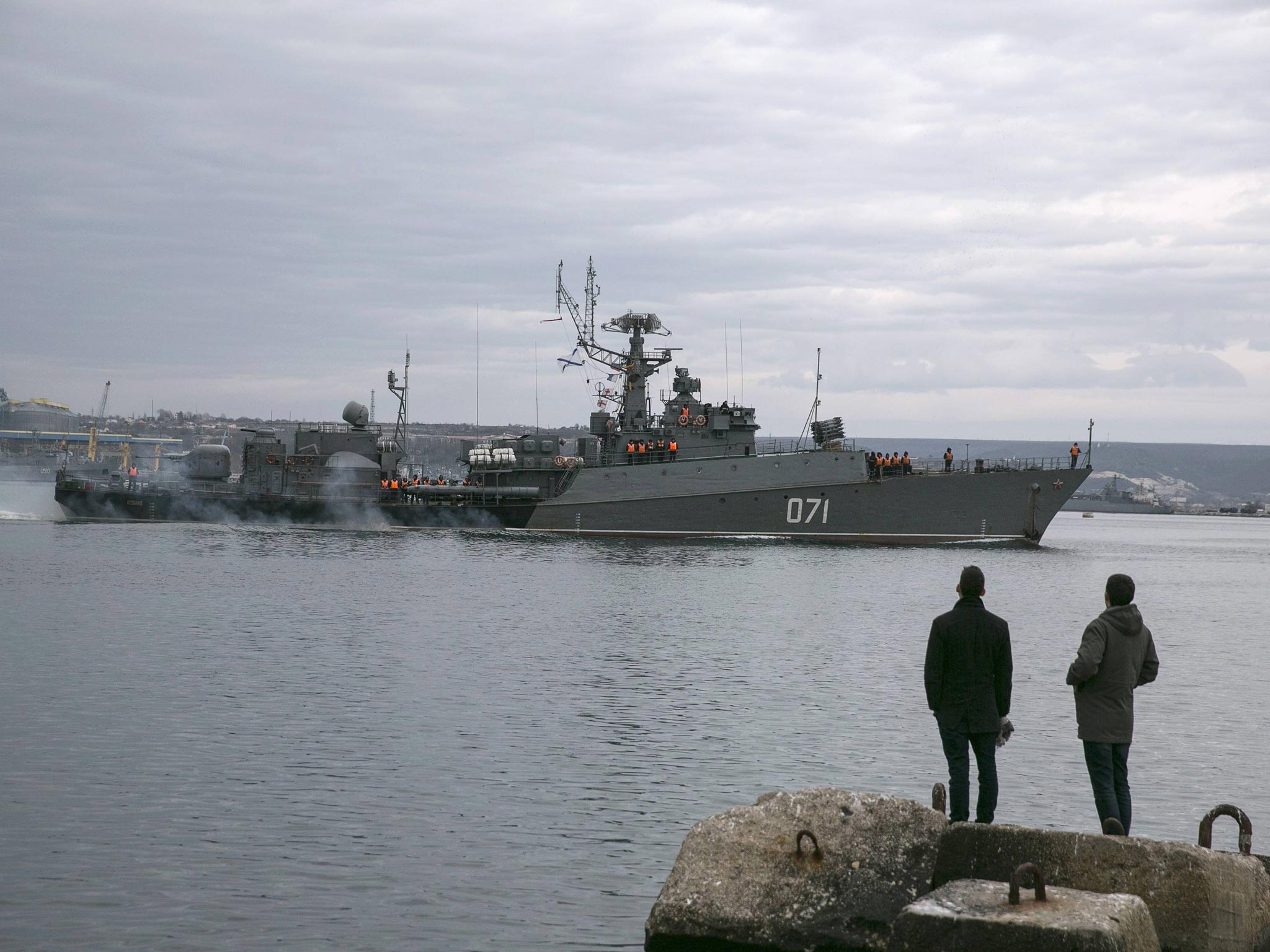 A Russian Navy ship enter the Crimean port city of Sevastopol