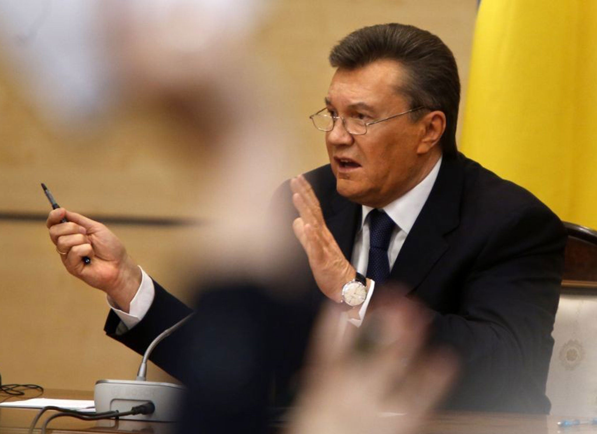Russia's ambassador to the UN told the council he was authorised to read a statement from Yanukovych (pictured) requesting Russian President Vladimir Putin to use his armed forces to restore peace and defend the people of Ukraine