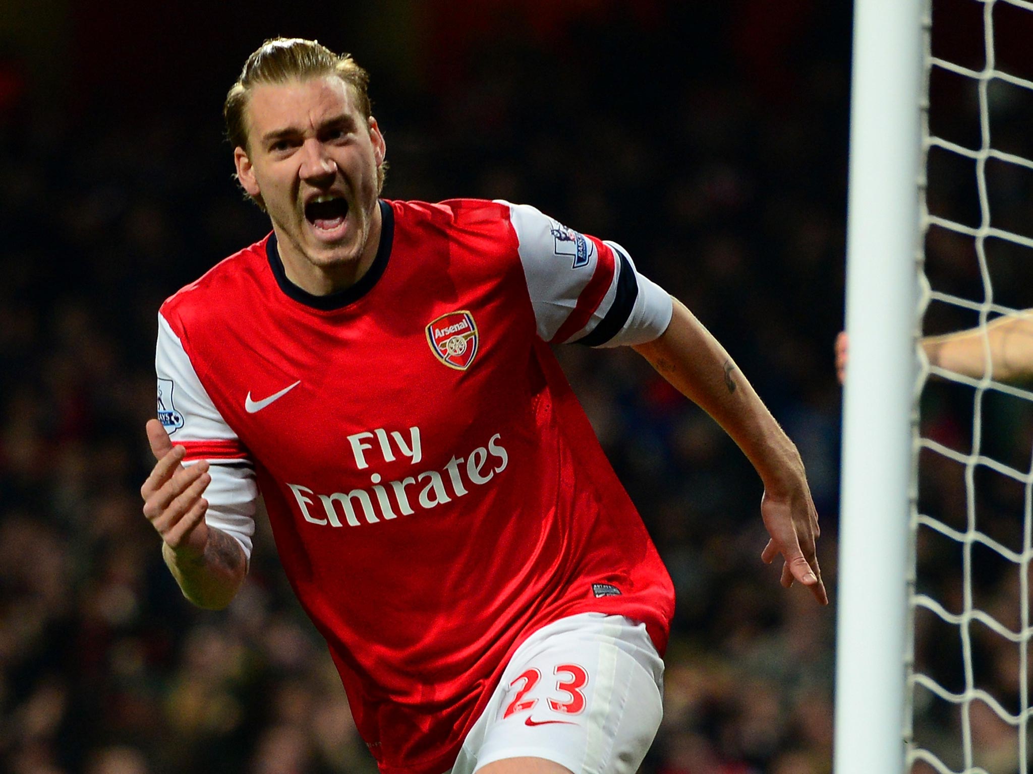 Nicklas Bendtner celebrates a goal for Arsenal in the real world