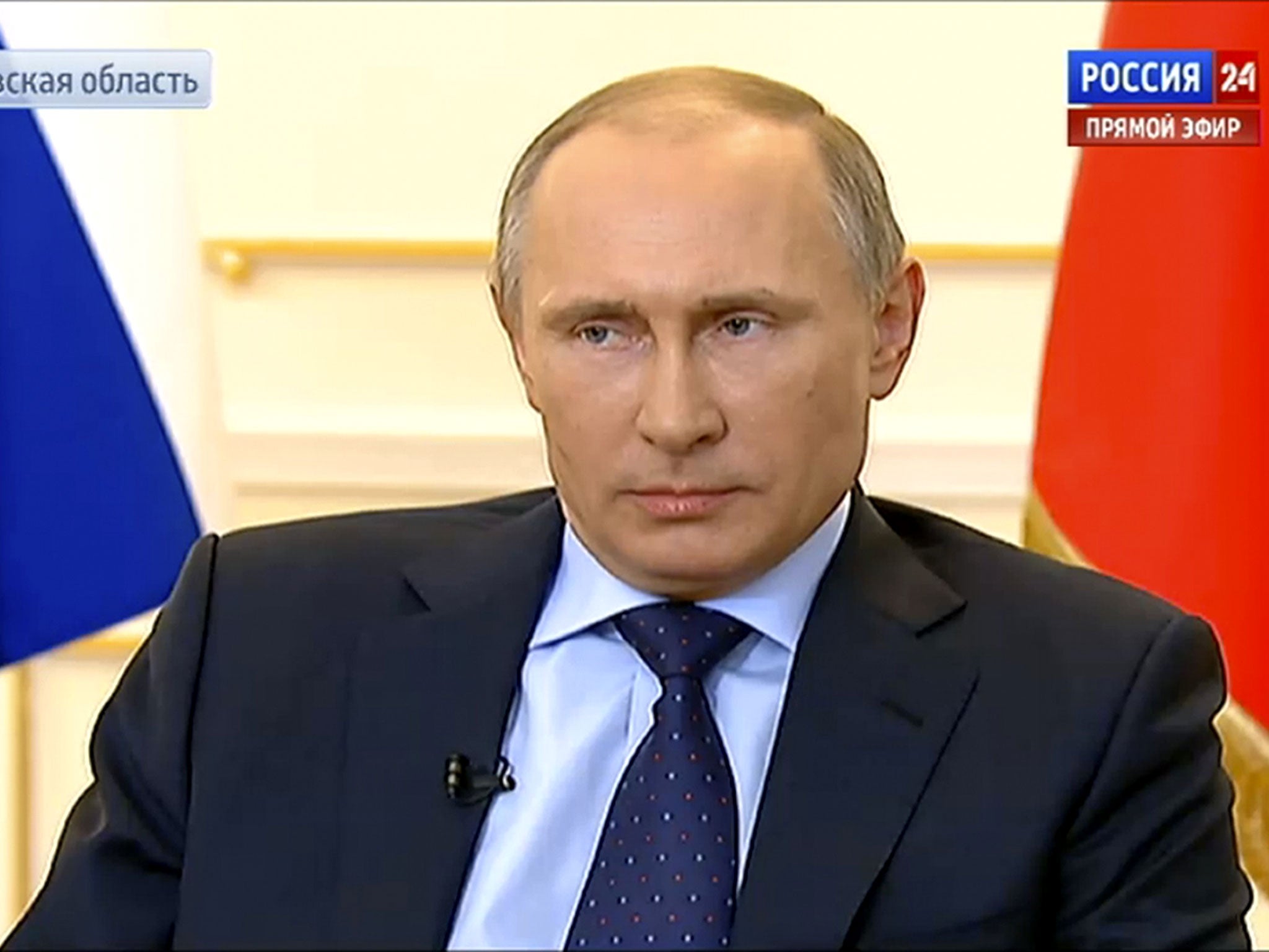 President Vladimir Putin, during a live feed, answers journalists' questions on the current situation around Ukraine at the Novo-Ogaryovo presidential residence outside Moscow