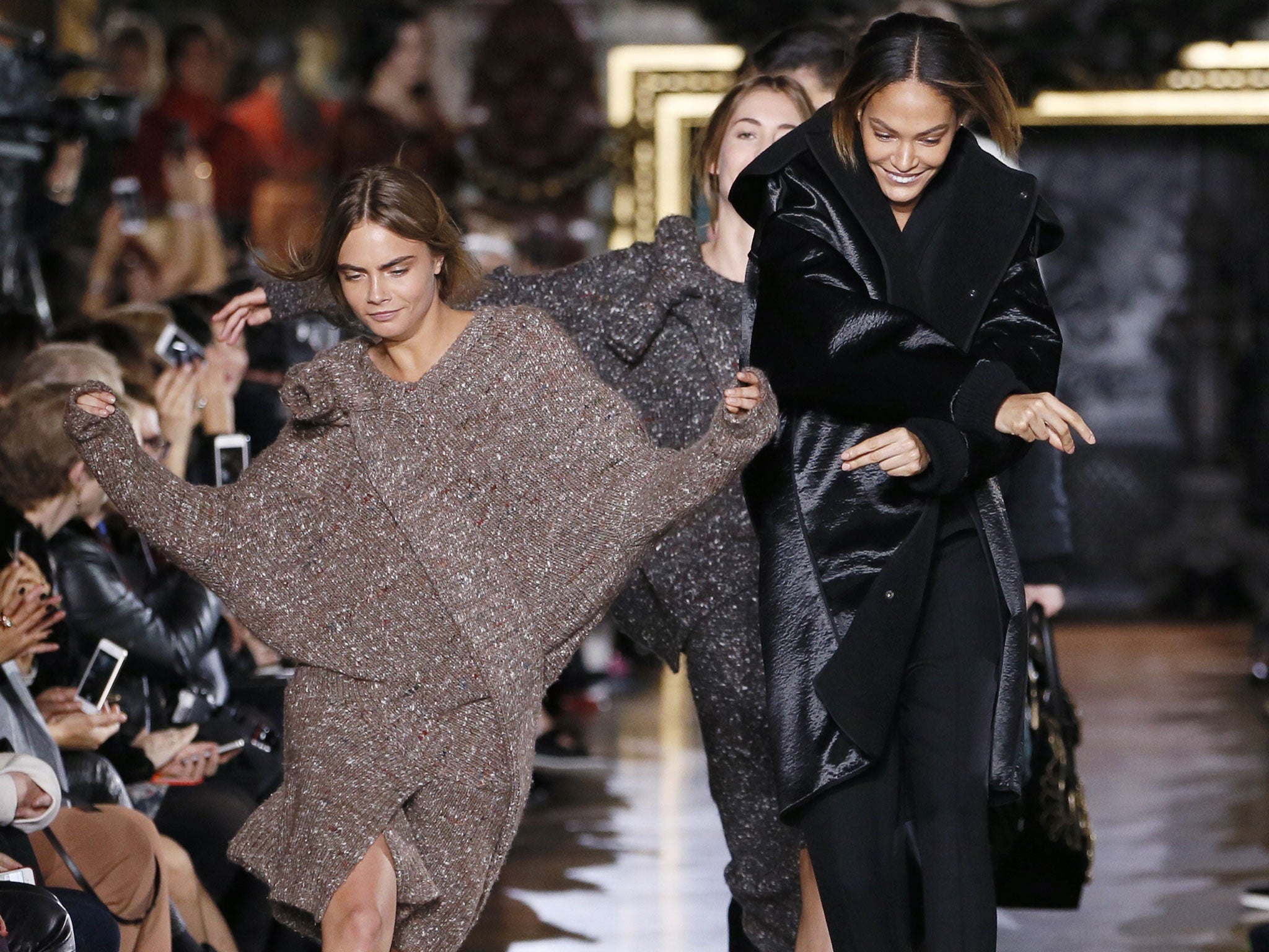 Cara Delevingne dances down the Stella McCartney catwalk