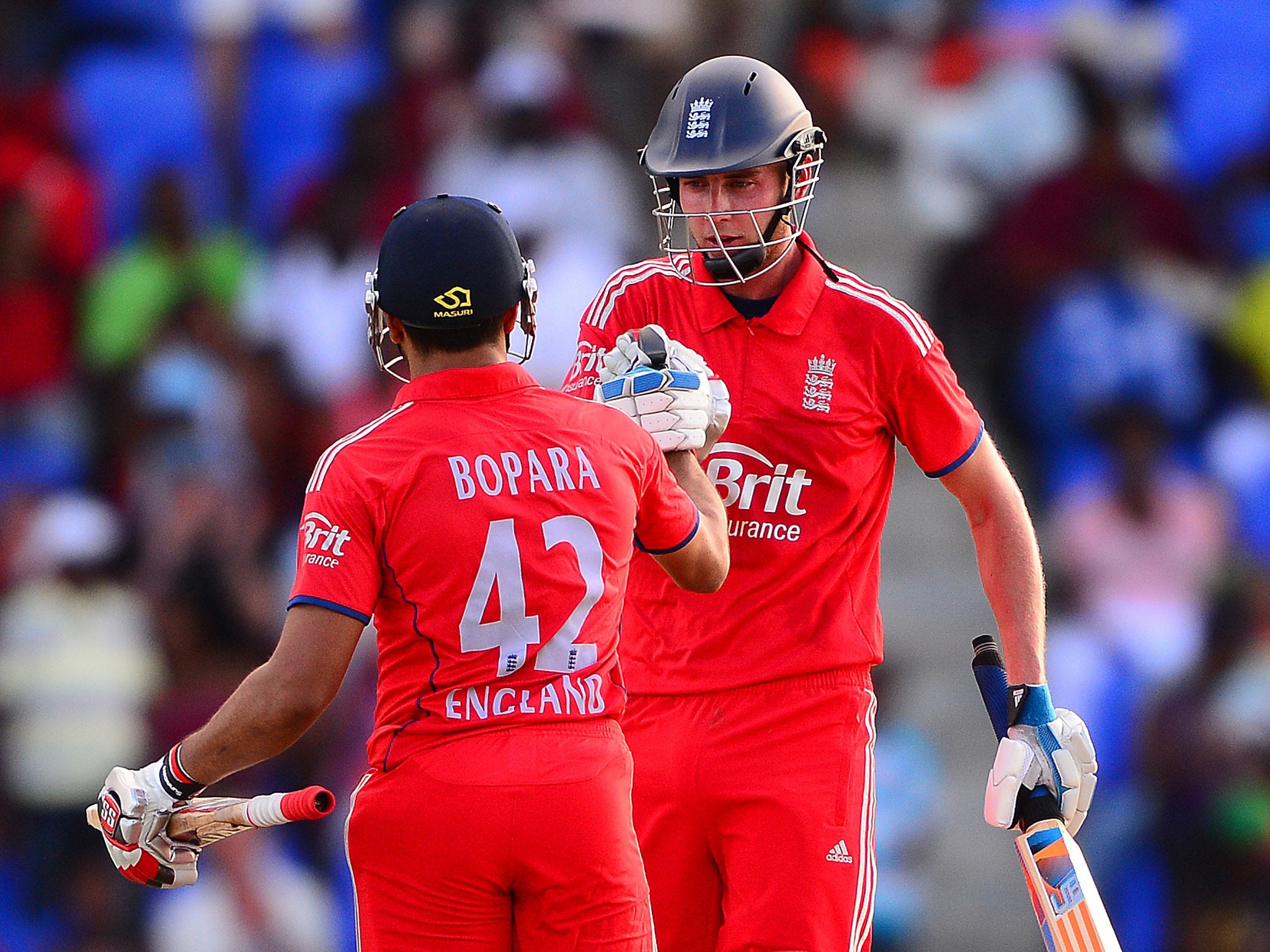 England's captain Stuart Broad (right) and Ravi Bopara celebrate their partnership as England win the second One Day International match against West Indies
