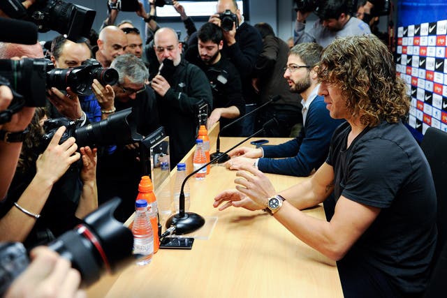 Carles Puyol of FC Barcelona faces the media during a press conference to announce he will be leaving the Catalan club at the end of the season