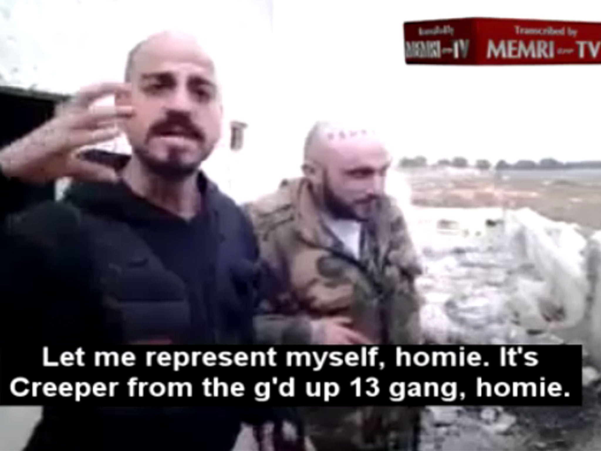 A still from a video posted by MEMRI TV allegedly showing LA gang members fighting for Bashar Al-Assad in Syria