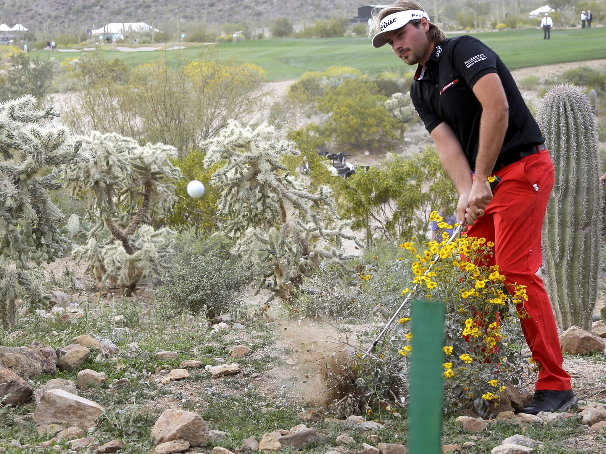 Victor Dubuisson pulls off a spectacular shot from the desert in last month’s World Match Play