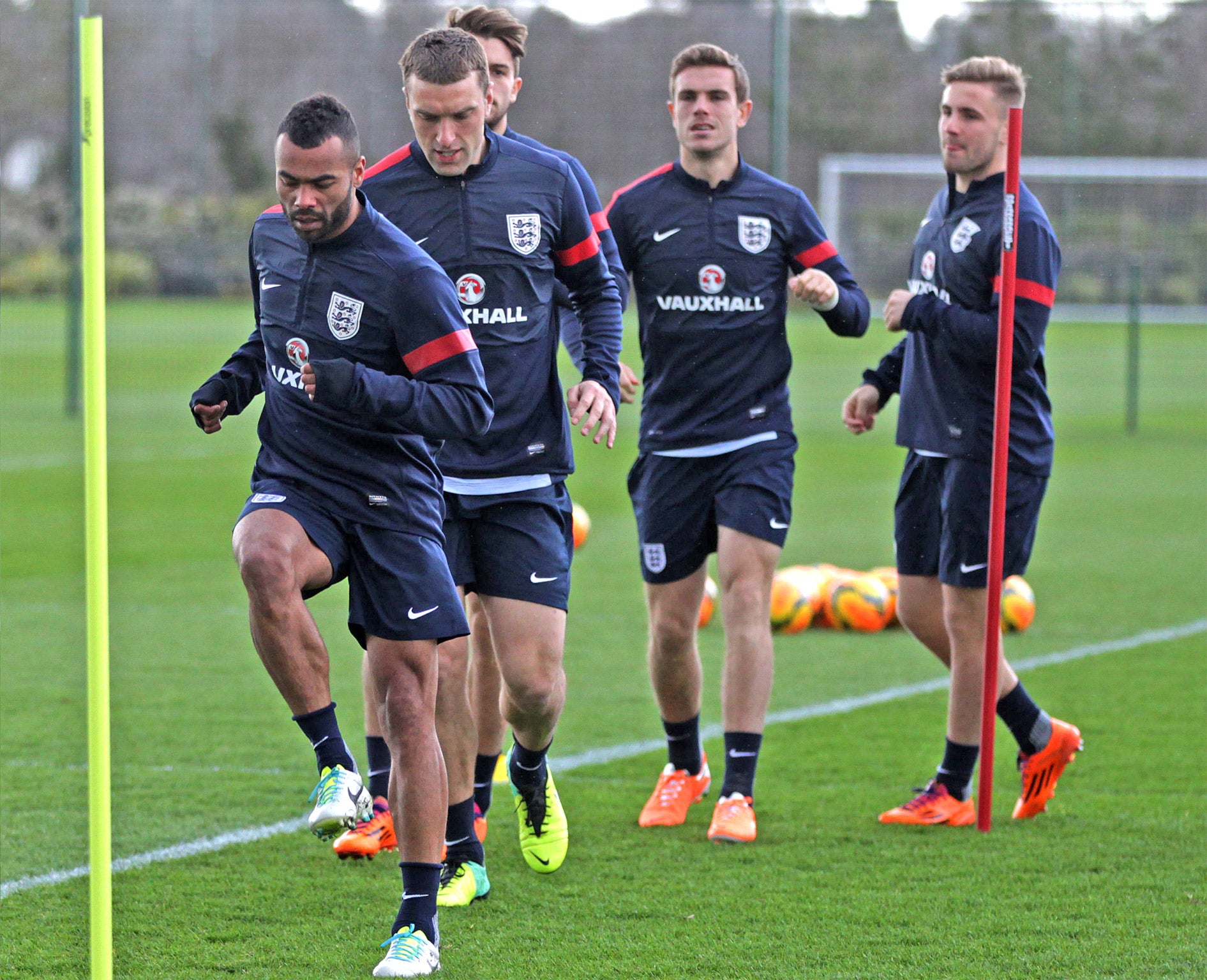 Ashley Cole (left) is in direct competition for a place in England’s World Cup squad with Luke Shaw (right)