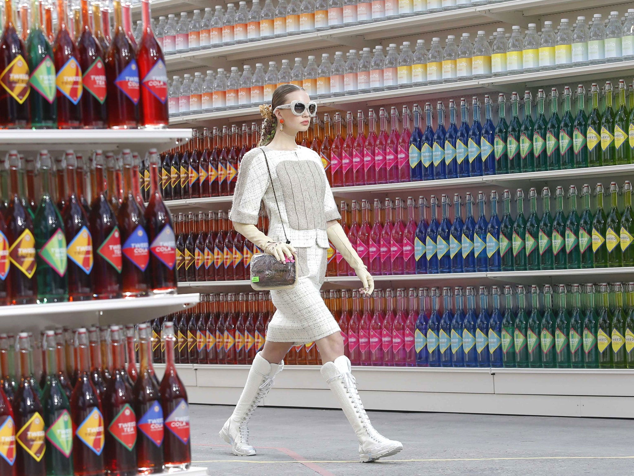 A model presents a creation by Chanel during Paris Fashion Week 2013