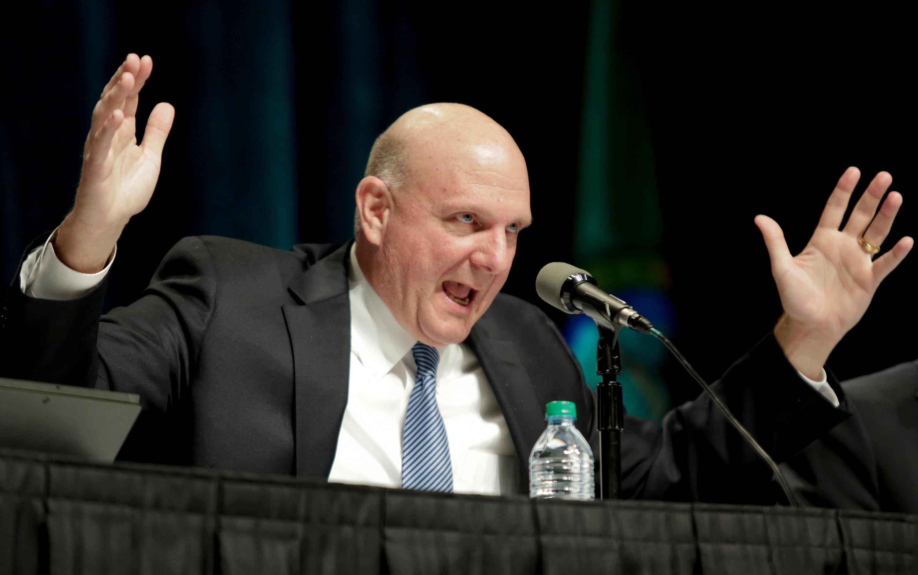 Ballmer answers questions at the company's annual shareholder meeting in Bellevue, Washington November 19, 2013.