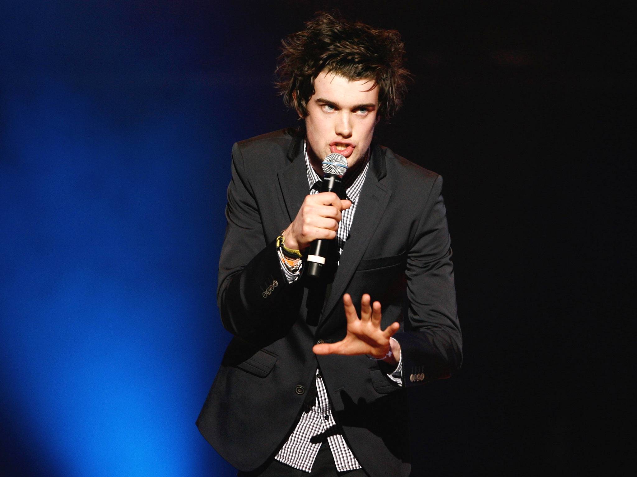 Comedian Jack Whitehall performs on stage