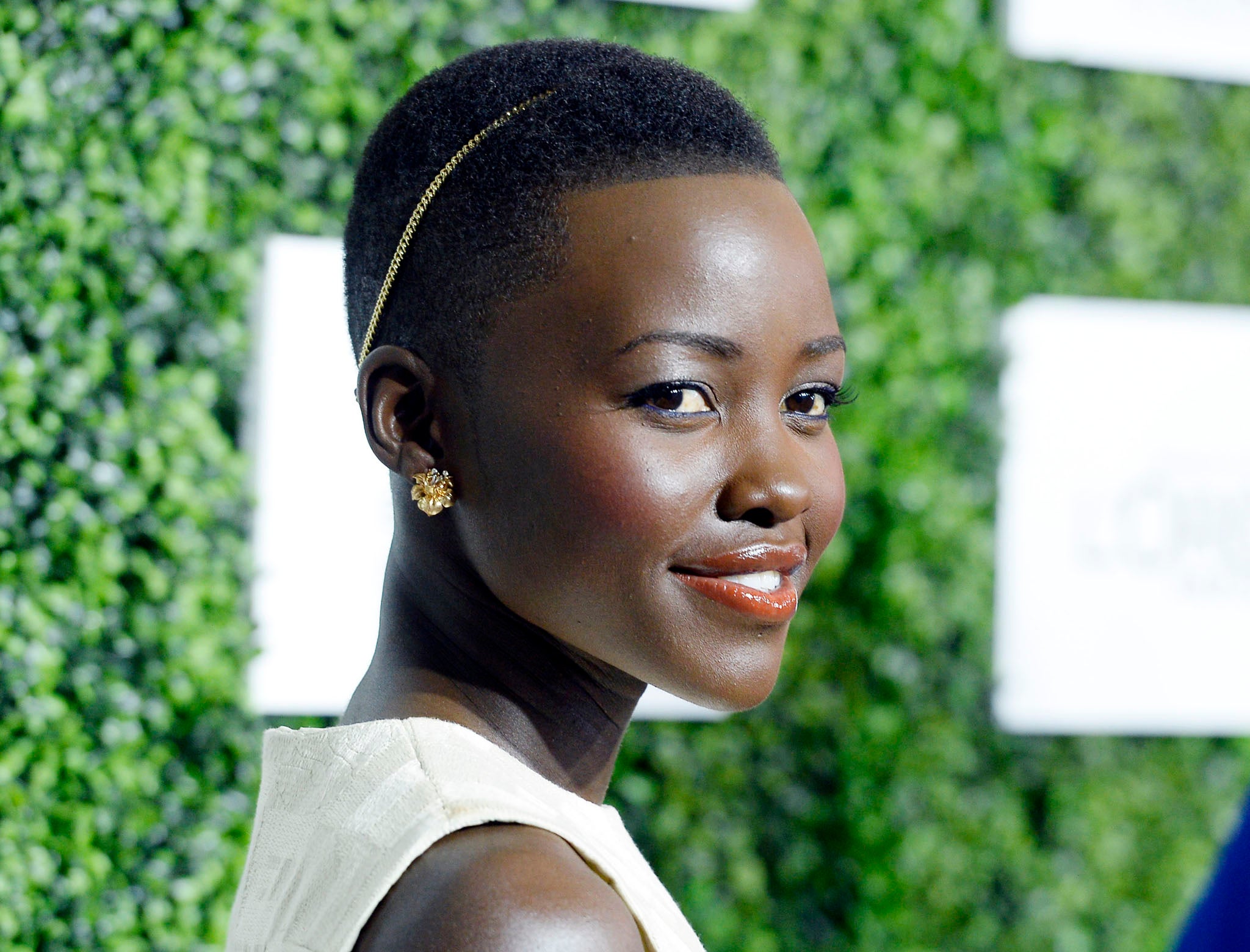 Lupita Nyong'o reflected on growing up with television's skewed representation of skin-tones during her childhood