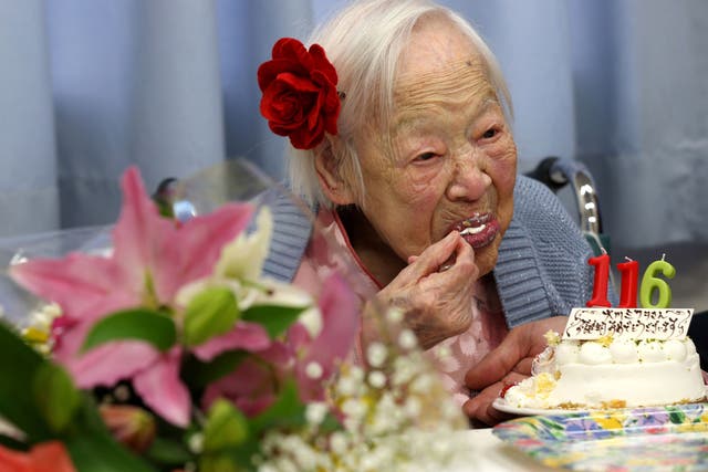 Misao Okawa, the world's oldest Japanese woman eats her birthday cake 