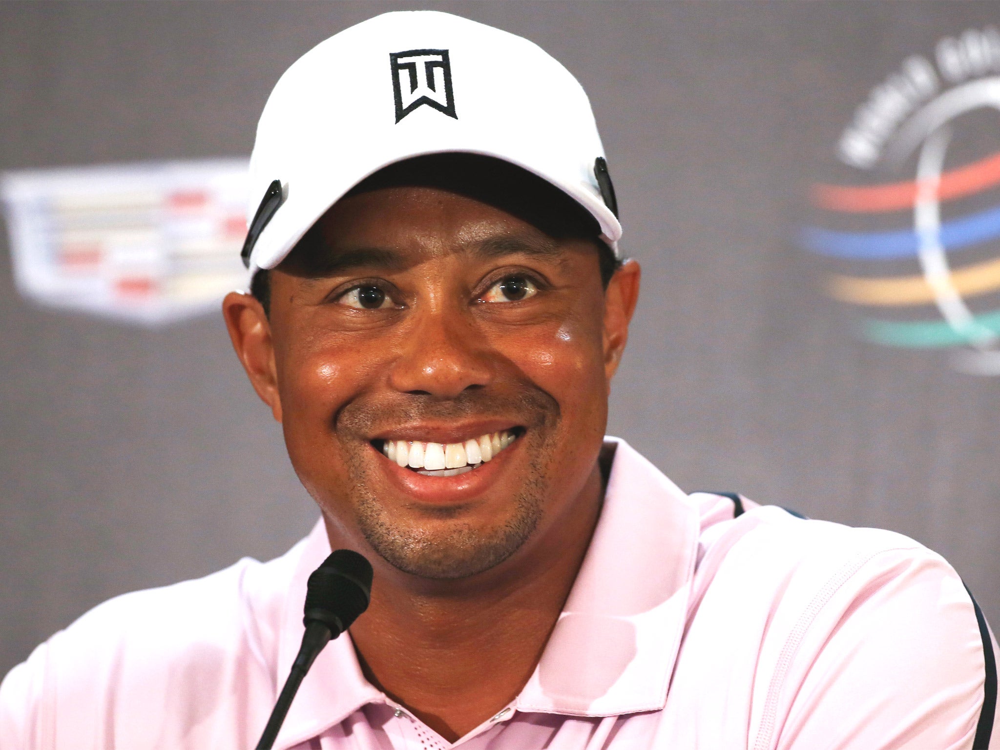 Tiger Woods laughs off his back problems