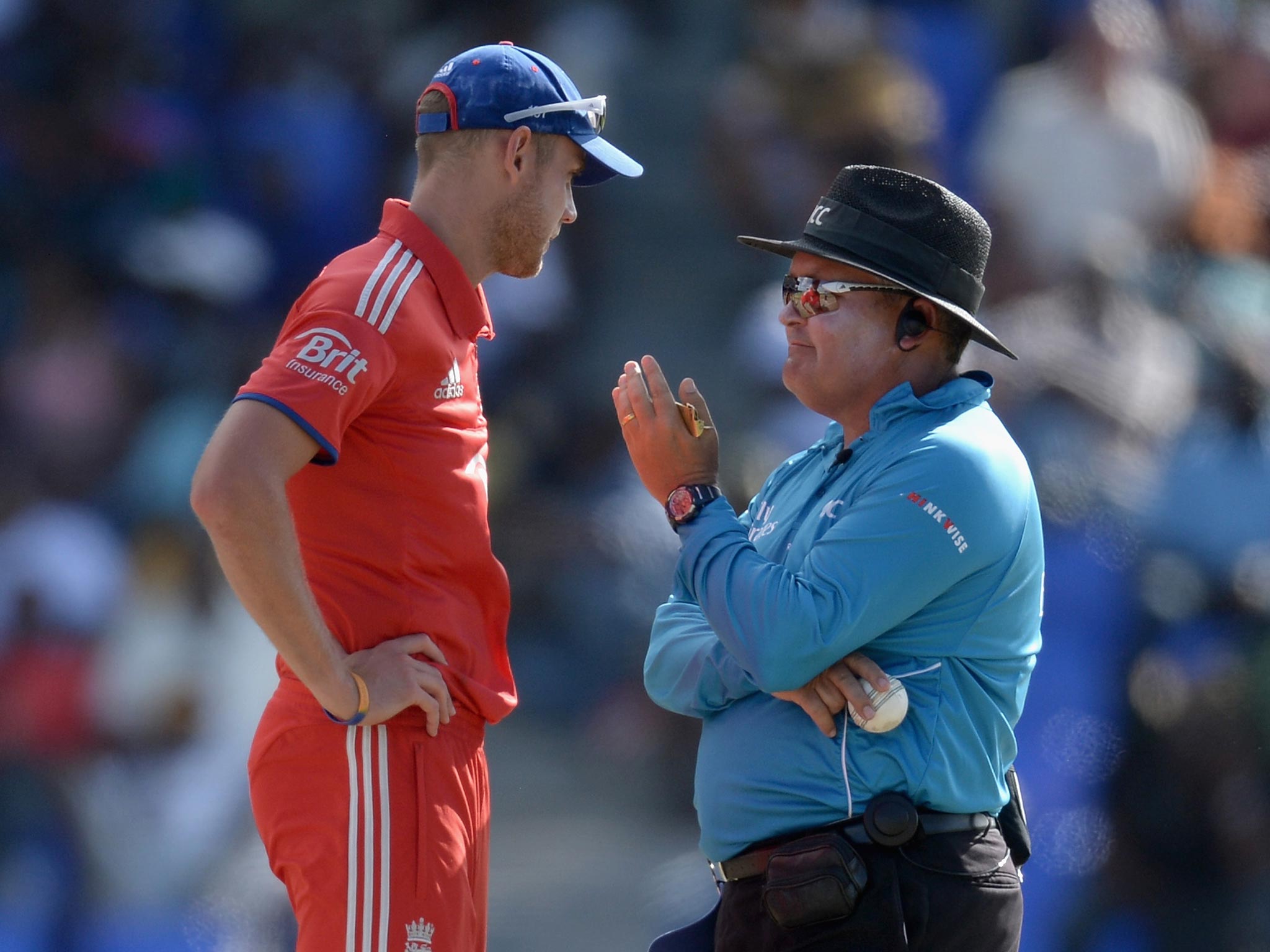 England captain Stuart Broad speaks with umpire Marais Erasmus during the 3rd One Day International between the West Indies and England