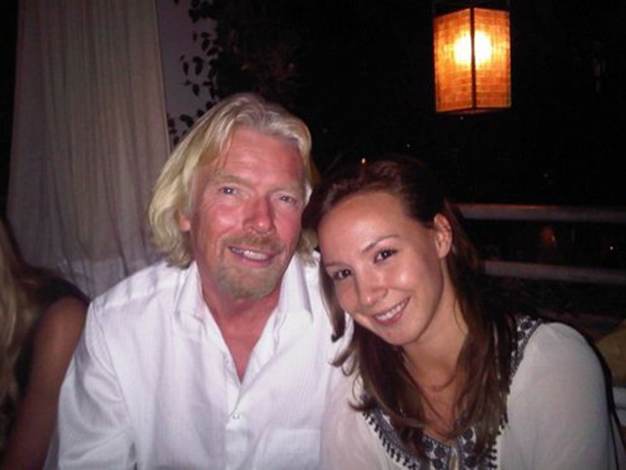 Autumn Radtke poses next to Virgin founder Richard Branson
