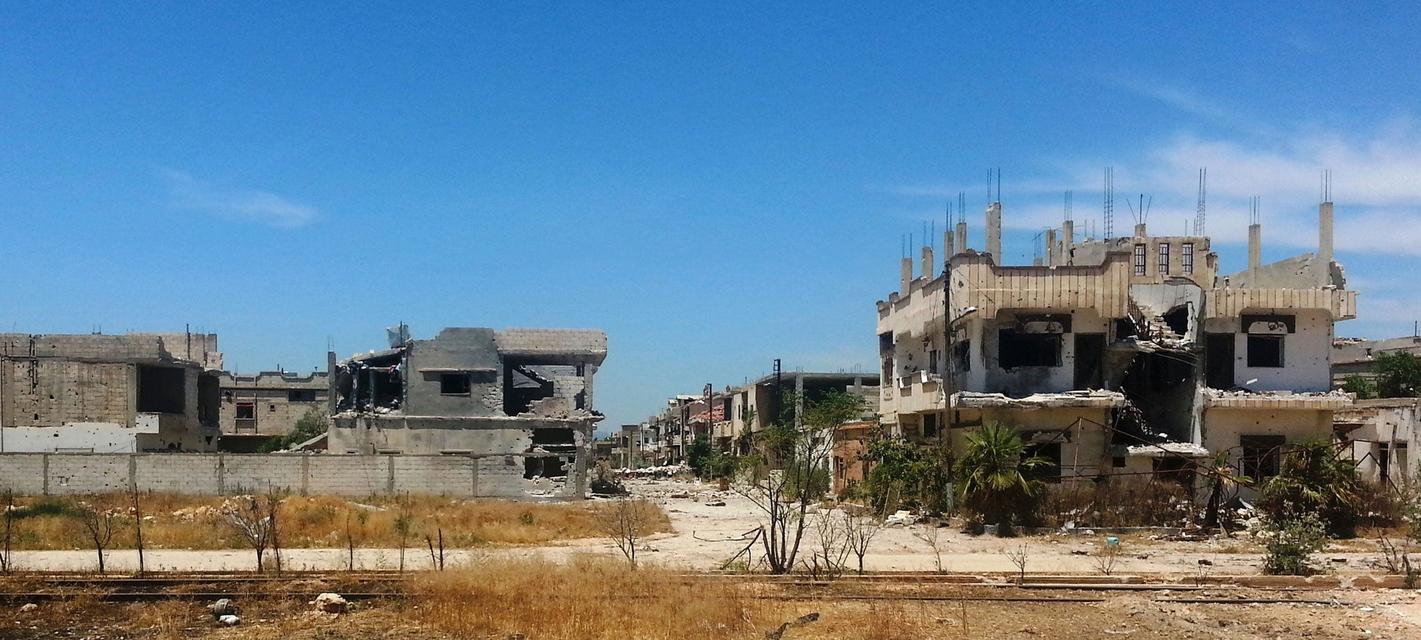 Heavily damaged buildings in the eastern city of Qusayr, bordering Lebanon in Syria's Homs province