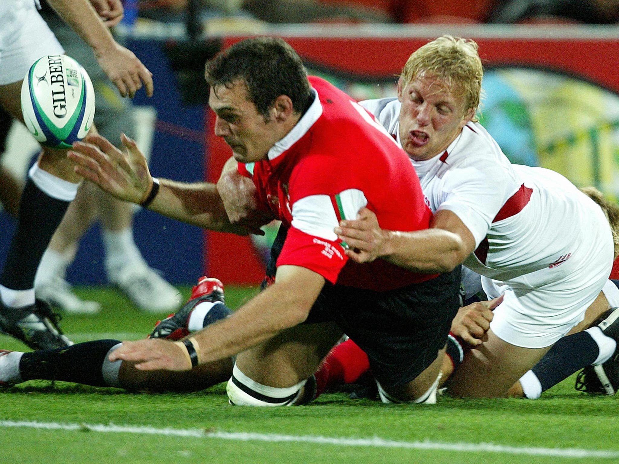 Getting to grips with Wales’ Robert Sidoli during the 2003 World Cup quarterfinal