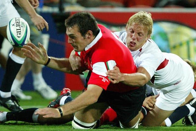 Getting to grips with Wales’ Robert Sidoli during the 2003 World Cup quarterfinal
