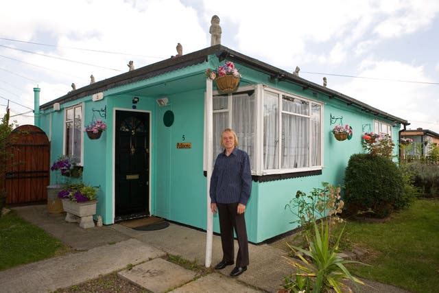 Jim Blackender, pictured in front of his prefab in July 2009, was the leader of a fight to save the prefabs from demolition. He now lives in Kent; his prefab home is now boarded up