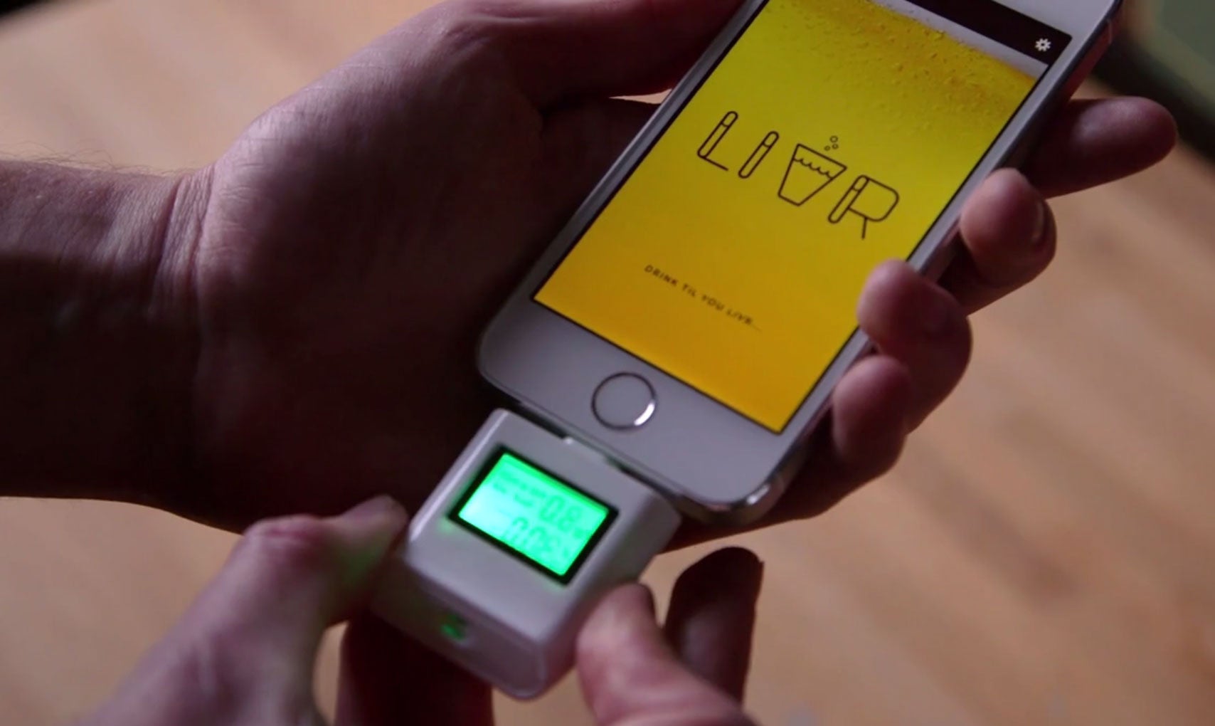 The Livr app and its breathalyser dongle