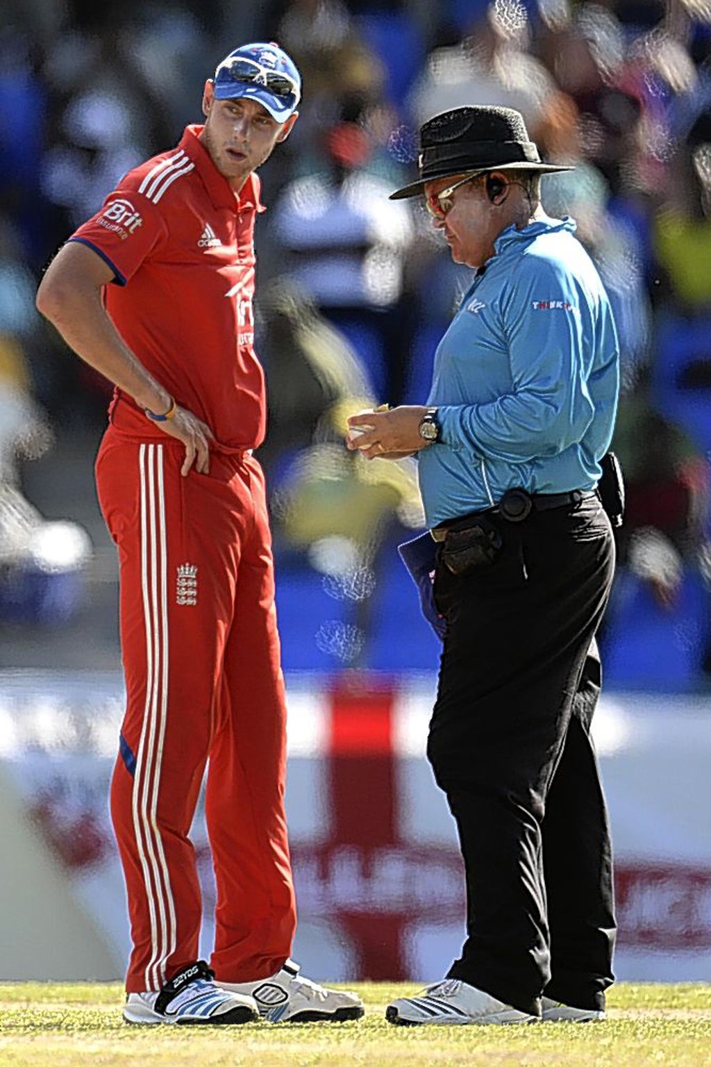 Stuart Broad is consulted by umpire Marais Erasmus over the condition of the ball