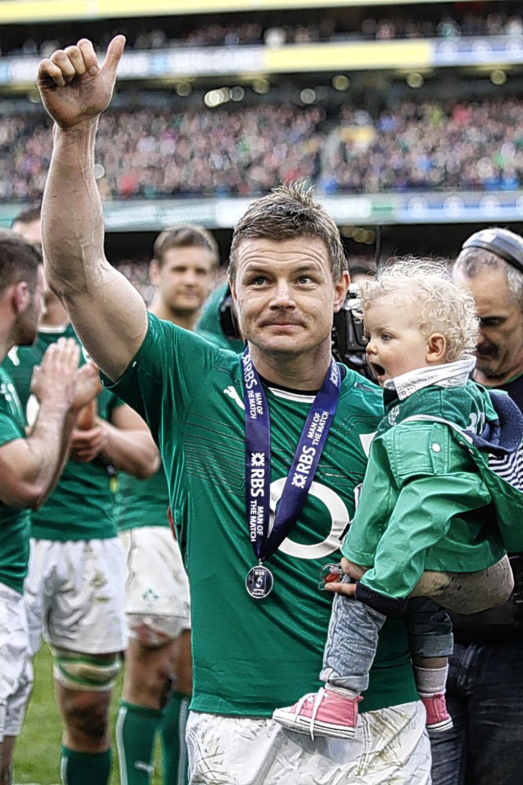 Child of Bod: Brian O’Driscoll lifts his daughter Sadie as leaves the pitch