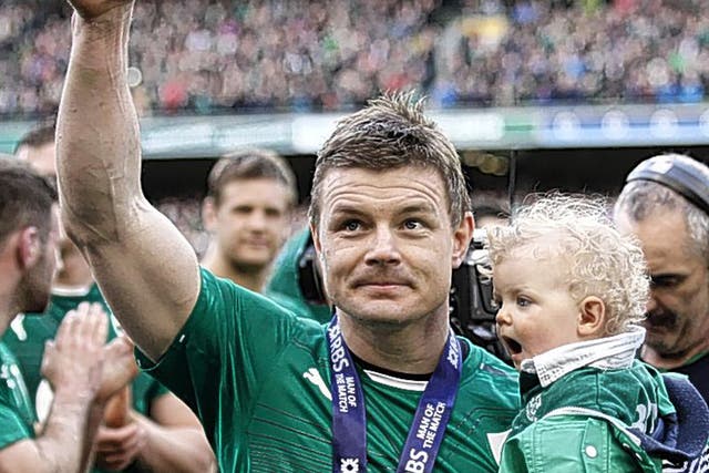 Child of Bod: Brian O’Driscoll lifts his daughter Sadie as leaves the pitch