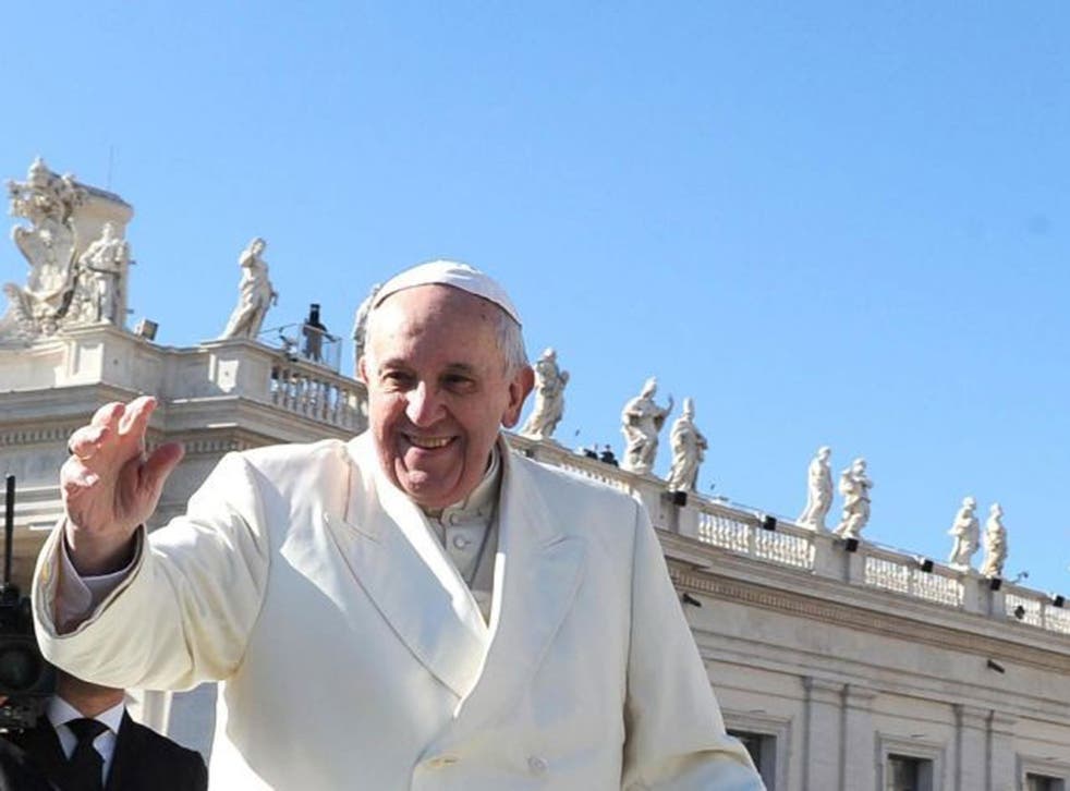 Pope Francis greets the crowds earlier this month