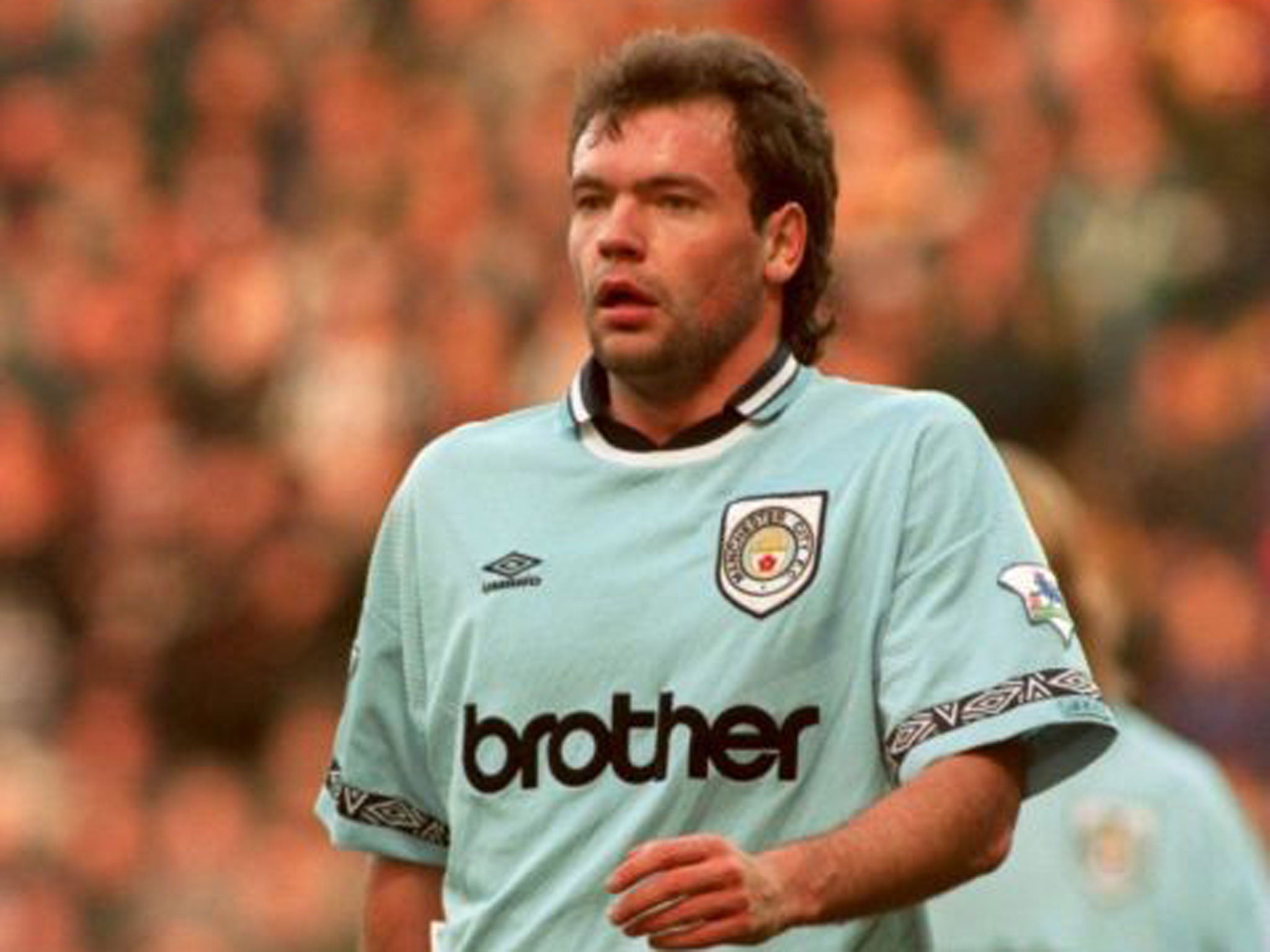 City slicker: Uwe Rösler in action for Manchester City in 1995