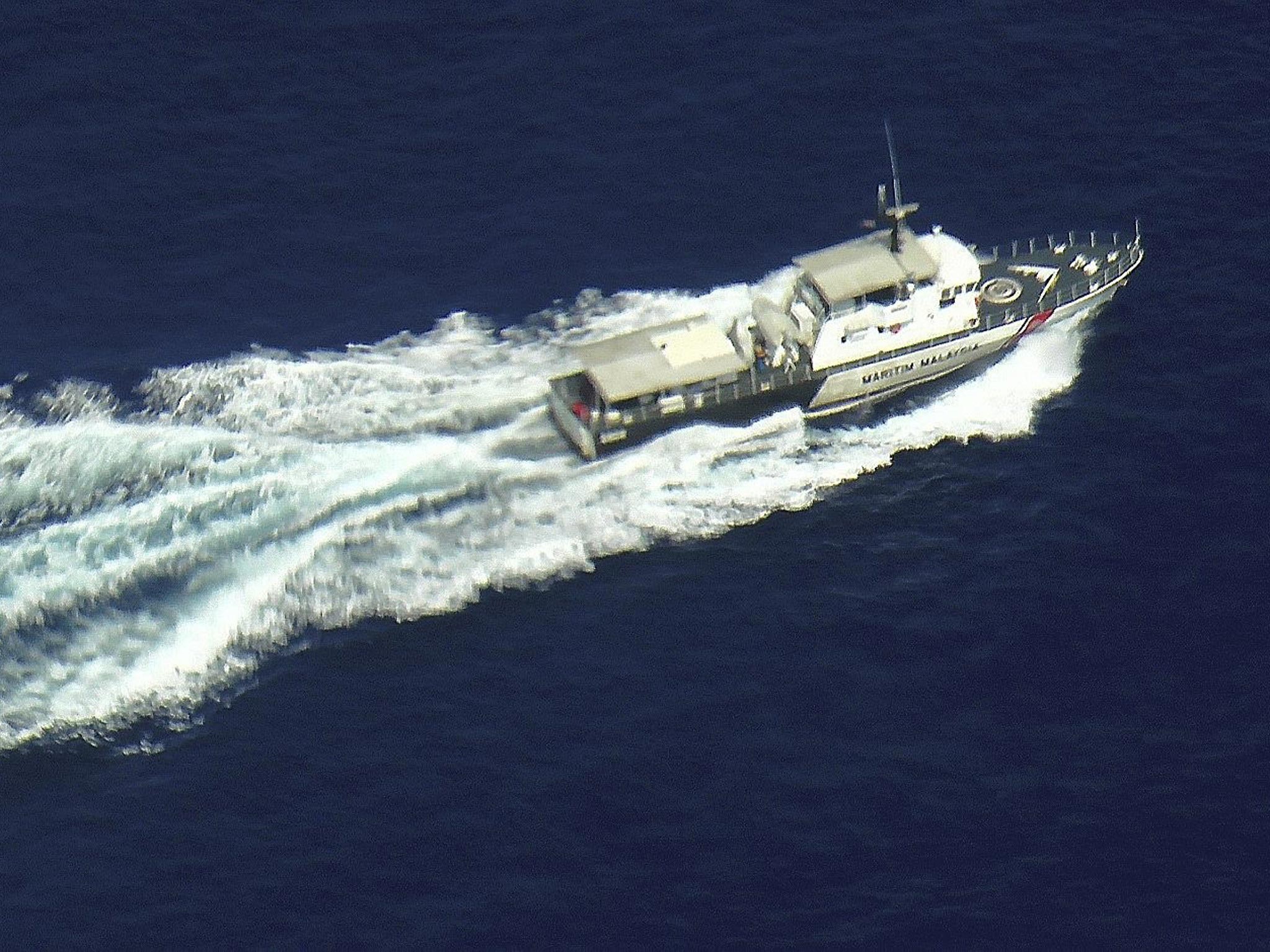 Malaysian coast guard ship during search and rescue operations for a missing Malaysian Airlines flight off the coast of Malaysia