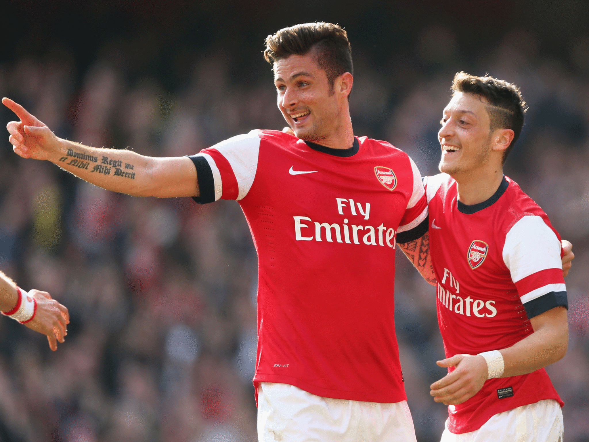 The recalled Giroud celebrates his second goal against Everton in yesterday's FA Cup match