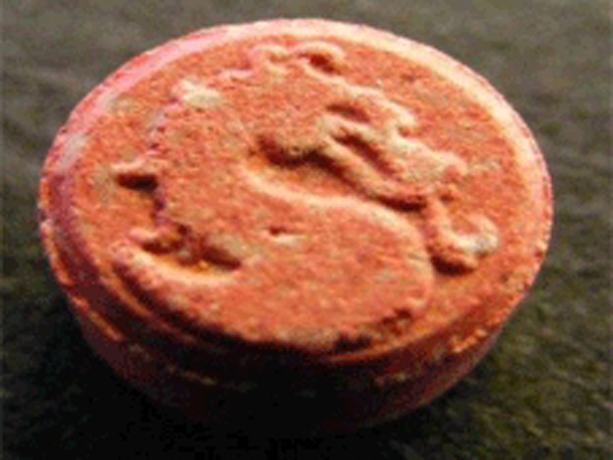 Mortal Kombat pills are red with a dragon imprint