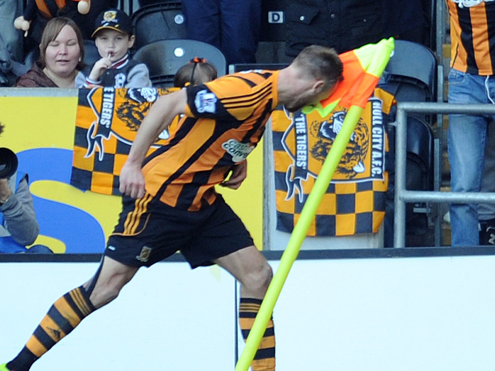 Hull's David Meyler celebrates his goal by headbutting the corner flag